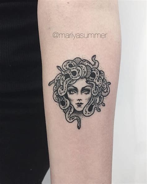 minimalist medusa tattoo small.